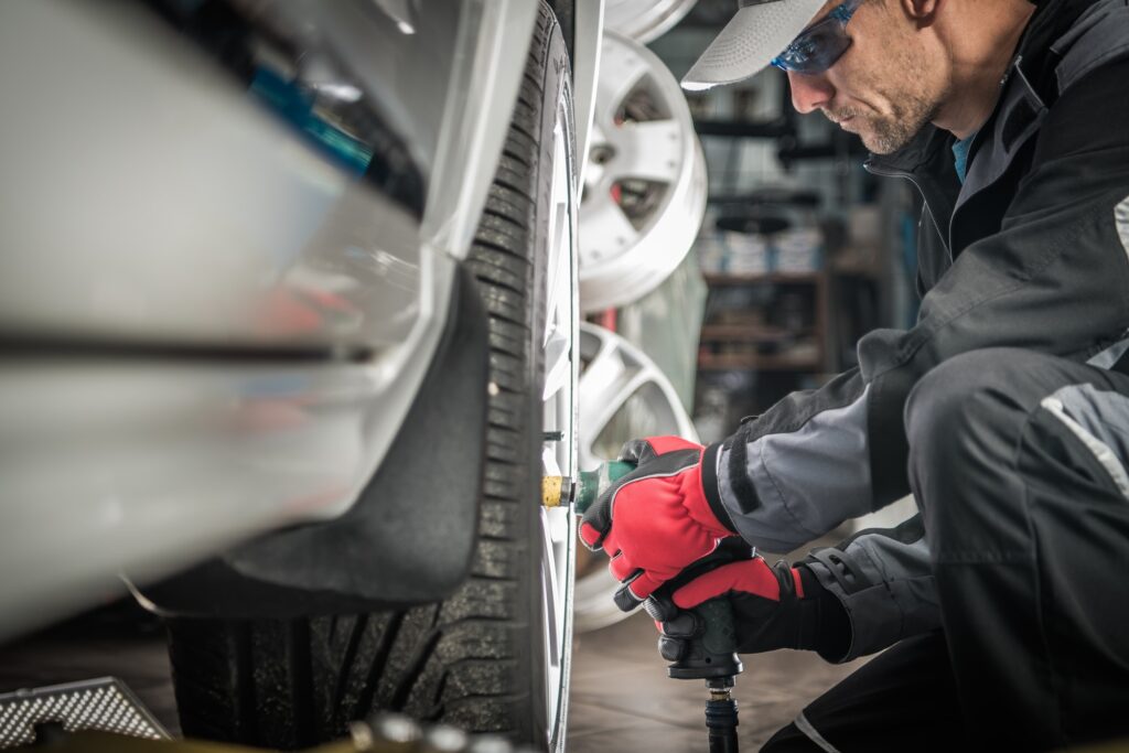 Mechanic changing a wheel